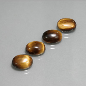 Tiger's Eye طبيعي بلون بني ذهبي، وزن ‎‎ قيراط، شكل بيضاوى، مقاس ‎8.8x6.8‎ مم