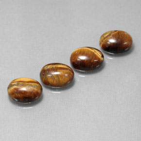 Tiger's Eye طبيعي بلون بني ذهبي، وزن ‎‎ قيراط، شكل بيضاوى، مقاس ‎9x7‎ مم