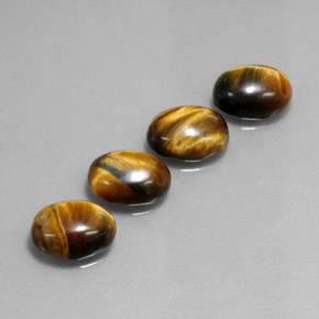 Tiger's Eye طبيعي بلون بني ذهبي، وزن ‎‎ قيراط، شكل بيضاوى، مقاس ‎8.9x6.9‎ مم