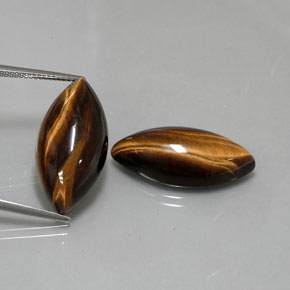 Tiger's Eye طبيعي بلون بني ذهبي، وزن ‎‎ قيراط، شكل ماركيز، مقاس ‎24.9x12.1‎ مم
