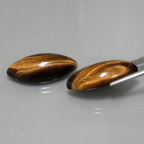 Tiger's Eye طبيعي بلون بني ذهبي، وزن ‎‎ قيراط، شكل ماركيز، مقاس ‎24.9x12.1‎ مم