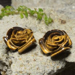 Tiger's Eye طبيعي بلون بنى دافئ، وزن ‎24.14‎ قيراط، شكل قطع زهرة، مقاس ‎16.1x15.2‎ مم
