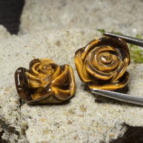 Tiger's Eye طبيعي بلون بني ذهبي، وزن ‎25.22‎ قيراط، شكل قطع زهرة، مقاس ‎16x15‎ مم