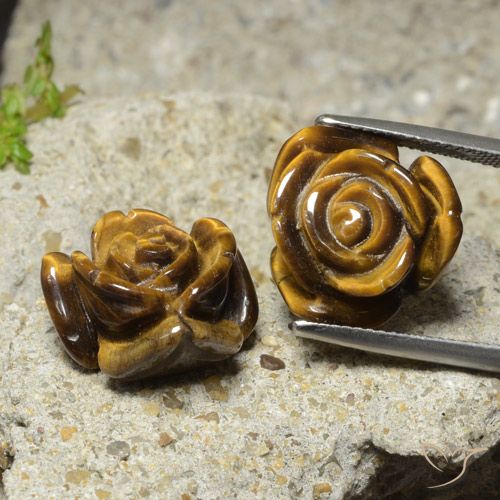 Tiger's Eye طبيعي بلون بني فاتح، وزن ‎22.12‎ قيراط، شكل قطع زهرة، مقاس ‎15.5x15.3‎ مم