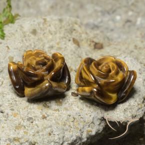 Tiger's Eye طبيعي بلون بني فاتح، وزن ‎22.12‎ قيراط، شكل قطع زهرة، مقاس ‎15.5x15.3‎ مم