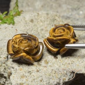 Tiger's Eye طبيعي بلون بني فاتح، وزن ‎22.12‎ قيراط، شكل قطع زهرة، مقاس ‎15.5x15.3‎ مم