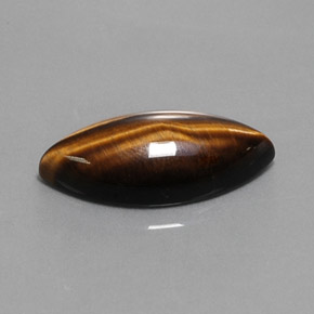 Tiger's Eye طبيعي بلون بني ذهبي، وزن ‎13.03‎ قيراط، شكل ماركيز، مقاس ‎24.8x12.1‎ مم