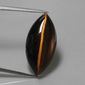 Tiger's Eye طبيعي بلون بني ذهبي، وزن ‎13.51‎ قيراط، شكل ماركيز، مقاس ‎24.9x12.2‎ مم