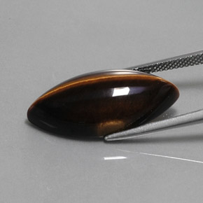 Tiger's Eye طبيعي بلون بني ذهبي، وزن ‎13.51‎ قيراط، شكل ماركيز، مقاس ‎24.9x12.2‎ مم