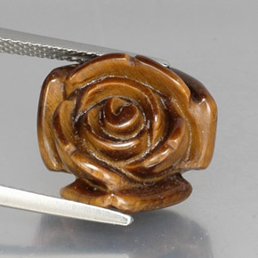 Tiger's Eye طبيعي بلون بني ذهبي، وزن ‎11.88‎ قيراط، شكل شكل خيالي، مقاس ‎15.3x15.1‎ مم