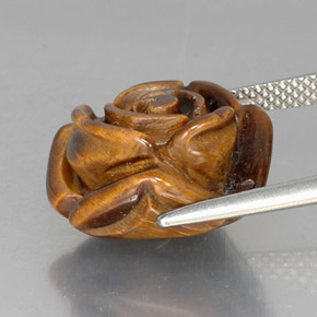 Tiger's Eye طبيعي بلون بني ذهبي، وزن ‎11.88‎ قيراط، شكل شكل خيالي، مقاس ‎15.3x15.1‎ مم