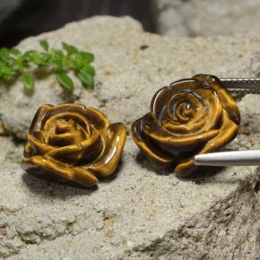 Tiger's Eye طبيعي بلون بنى متوسط، وزن ‎23.82‎ قيراط، شكل قطع زهرة، مقاس ‎15.7x15.3‎ مم
