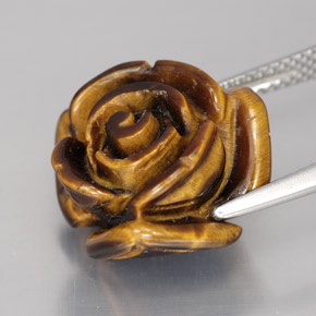 Tiger's Eye طبيعي بلون بني ذهبي، وزن ‎11.90‎ قيراط، شكل شكل خيالي، مقاس ‎15.4x15‎ مم