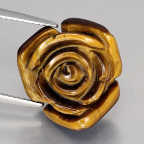Tiger's Eye طبيعي بلون بني ذهبي، وزن ‎12.47‎ قيراط، شكل شكل خيالي، مقاس ‎15.8x15‎ مم