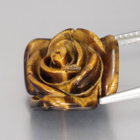 Tiger's Eye طبيعي بلون بني ذهبي، وزن ‎11.62‎ قيراط، شكل شكل خيالي، مقاس ‎16.1x15.6‎ مم