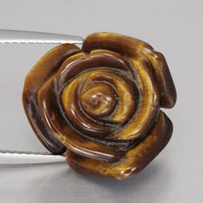 Tiger's Eye طبيعي بلون بني ذهبي، وزن ‎10.60‎ قيراط، شكل شكل خيالي، مقاس ‎15.8x15.6‎ مم