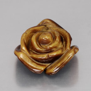 Tiger's Eye طبيعي بلون بني ذهبي، وزن ‎10.60‎ قيراط، شكل شكل خيالي، مقاس ‎15.8x15.6‎ مم