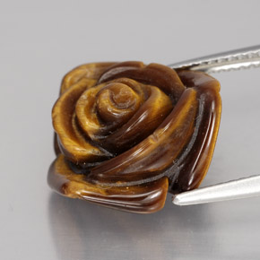Tiger's Eye طبيعي بلون بني ذهبي، وزن ‎10.60‎ قيراط، شكل شكل خيالي، مقاس ‎15.8x15.6‎ مم