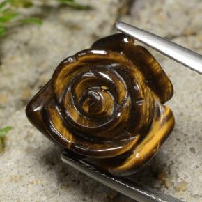 Tiger's Eye طبيعي بلون بني ذهبي، وزن ‎12.02‎ قيراط، شكل قطع زهرة، مقاس ‎15.3x15.2‎ مم