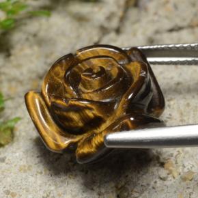 Tiger's Eye طبيعي بلون بني ذهبي، وزن ‎12.02‎ قيراط، شكل قطع زهرة، مقاس ‎15.3x15.2‎ مم