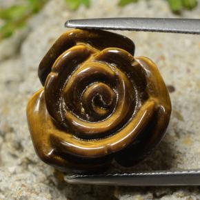 Tiger's Eye طبيعي بلون بني ذهبي، وزن ‎13.31‎ قيراط، شكل قطع زهرة، مقاس ‎16.1x15.7‎ مم