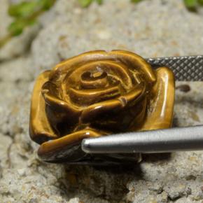 Tiger's Eye طبيعي بلون بني ذهبي، وزن ‎13.31‎ قيراط، شكل قطع زهرة، مقاس ‎16.1x15.7‎ مم