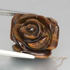 Tiger's Eye طبيعي بلون بني محمر، وزن ‎12.89‎ قيراط، شكل قطع زهرة، مقاس ‎16.3x15.7‎ مم