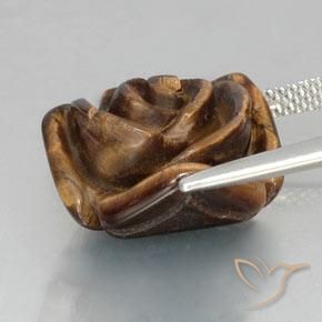 Tiger's Eye طبيعي بلون بني محمر، وزن ‎12.89‎ قيراط، شكل قطع زهرة، مقاس ‎16.3x15.7‎ مم