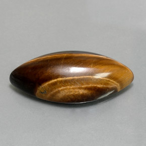 Tiger's Eye طبيعي بلون بني ذهبي، وزن ‎12.99‎ قيراط، شكل ماركيز، مقاس ‎24.8x12‎ مم