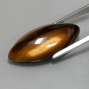 Tiger's Eye طبيعي بلون بني ذهبي، وزن ‎13.60‎ قيراط، شكل ماركيز، مقاس ‎25x12.2‎ مم