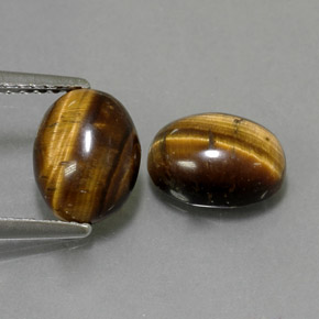 Tiger's Eye طبيعي بلون بني ذهبي، وزن ‎‎ قيراط، شكل بيضاوى، مقاس ‎8.8x6.8‎ مم