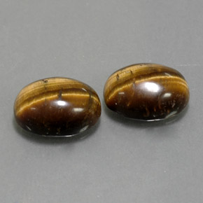 Tiger's Eye طبيعي بلون بني ذهبي، وزن ‎‎ قيراط، شكل بيضاوى، مقاس ‎8.8x6.8‎ مم