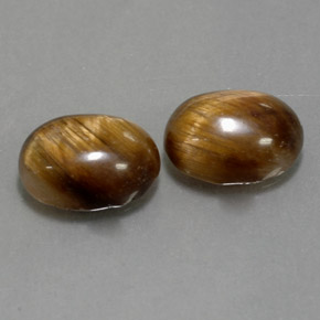 Tiger's Eye طبيعي بلون بني ذهبي، وزن ‎‎ قيراط، شكل بيضاوى، مقاس ‎8.8x6.8‎ مم