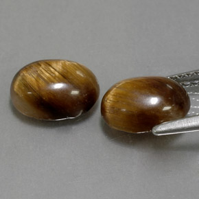 Tiger's Eye طبيعي بلون بني ذهبي، وزن ‎‎ قيراط، شكل بيضاوى، مقاس ‎8.8x6.8‎ مم