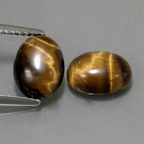 Tiger's Eye طبيعي بلون بني ذهبي، وزن ‎‎ قيراط، شكل بيضاوى، مقاس ‎8.9x6.9‎ مم