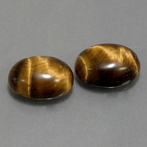 Tiger's Eye طبيعي بلون بني ذهبي، وزن ‎‎ قيراط، شكل بيضاوى، مقاس ‎8.9x6.9‎ مم