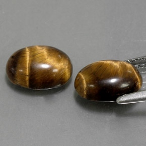 Tiger's Eye طبيعي بلون بني ذهبي، وزن ‎‎ قيراط، شكل بيضاوى، مقاس ‎8.9x6.9‎ مم
