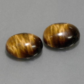 Tiger's Eye طبيعي بلون بني ذهبي، وزن ‎‎ قيراط، شكل بيضاوى، مقاس ‎8.8x6.8‎ مم