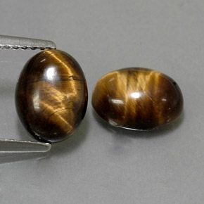 Tiger's Eye طبيعي بلون بني ذهبي، وزن ‎‎ قيراط، شكل بيضاوى، مقاس ‎8.9x7‎ مم