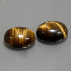 Tiger's Eye طبيعي بلون بني ذهبي، وزن ‎‎ قيراط، شكل بيضاوى، مقاس ‎8.9x7‎ مم