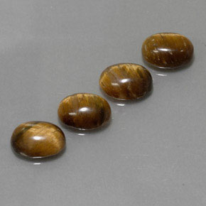 Tiger's Eye طبيعي بلون بني ذهبي، وزن ‎‎ قيراط، شكل بيضاوى، مقاس ‎8.8x6.8‎ مم