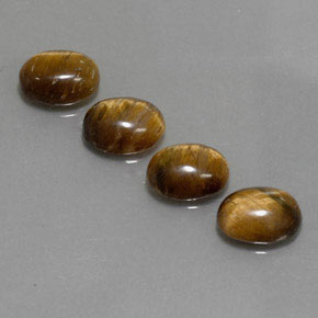 Tiger's Eye طبيعي بلون بني ذهبي، وزن ‎‎ قيراط، شكل بيضاوى، مقاس ‎8.8x6.8‎ مم