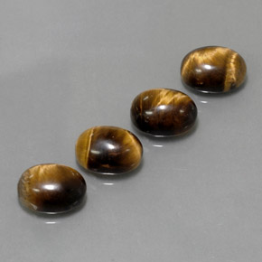 Tiger's Eye طبيعي بلون بني ذهبي، وزن ‎‎ قيراط، شكل بيضاوى، مقاس ‎8.8x7.1‎ مم