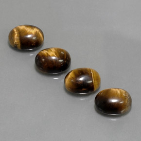 Tiger's Eye طبيعي بلون بني ذهبي، وزن ‎‎ قيراط، شكل بيضاوى، مقاس ‎8.8x7.1‎ مم