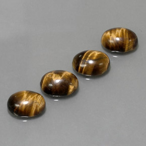Tiger's Eye طبيعي بلون بني ذهبي، وزن ‎‎ قيراط، شكل بيضاوى، مقاس ‎8.9x6.9‎ مم