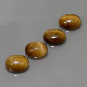 Tiger's Eye طبيعي بلون بني ذهبي، وزن ‎‎ قيراط، شكل بيضاوى، مقاس ‎8.9x6.9‎ مم
