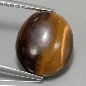 Tiger's Eye طبيعي بلون بني ذهبي، وزن ‎14.18‎ قيراط، شكل بيضاوى، مقاس ‎17.9x15.3‎ مم