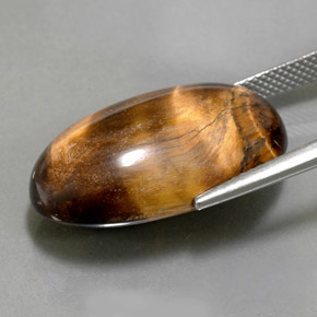 Tiger's Eye طبيعي بلون بني ذهبي، وزن ‎26.13‎ قيراط، شكل بيضاوى، مقاس ‎24.8x15.3‎ مم