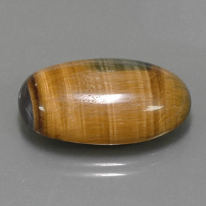 Tiger's Eye طبيعي بلون بني ذهبي، وزن ‎19.16‎ قيراط، شكل بيضاوى، مقاس ‎23.6x14.7‎ مم