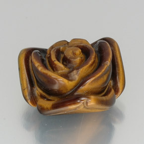 Tiger's Eye طبيعي بلون أسود، وزن ‎11.96‎ قيراط، شكل شكل خيالي، مقاس ‎15.1x14.3‎ مم